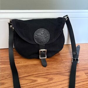 Black Crossbody Bag with Adjustable Strap and Minimalist Design